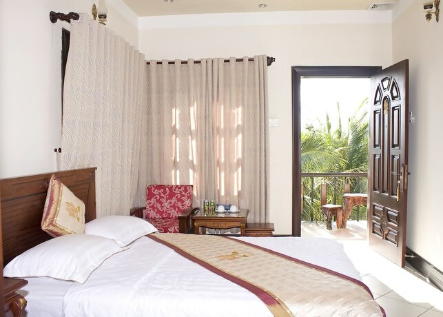 Imagen de la habitación del Hotel Con Ga Vang Resort. Foto 22