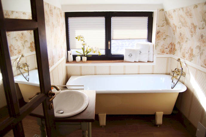 Imagen de la habitación del Hotel Conacul Lilium. Foto 4