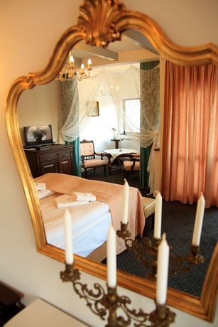Imagen de la habitación del Hotel Conacul Lilium. Foto 10