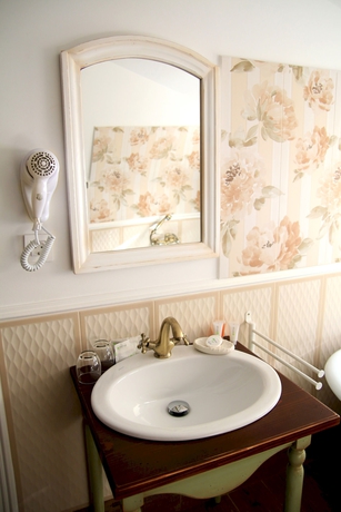Imagen de la habitación del Hotel Conacul Lilium. Foto 12