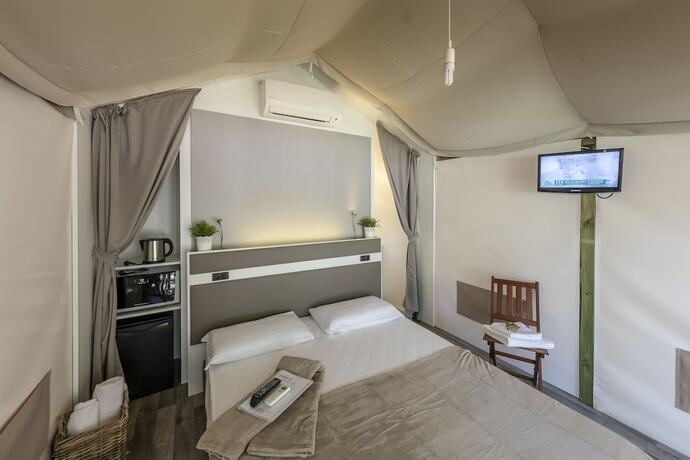 Imagen de la habitación del Hotel Conca d\'Oro Camping and Lodge. Foto 19