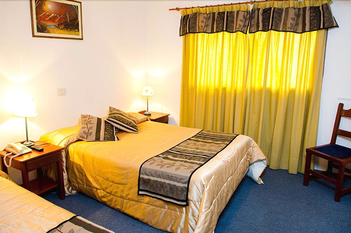 Imagen de la habitación del Hotel Concept Bariloche. Foto 10
