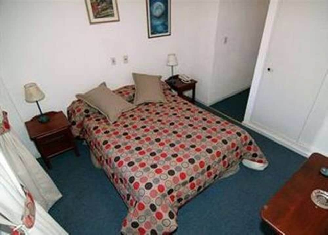 Imagen de la habitación del Hotel Concept Bariloche. Foto 16