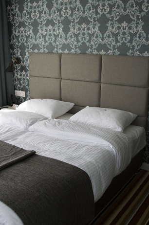 Imagen de la habitación del Hotel Concept. Foto 7