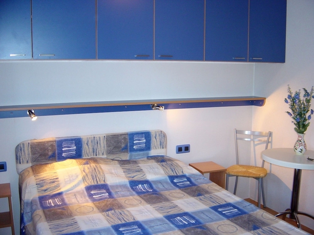 Imagen de la habitación del Hotel Concept Village Piccola Gardiola. Foto 9