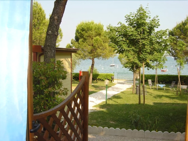 Imagen de la habitación del Hotel Concept Village Piccola Gardiola. Foto 16