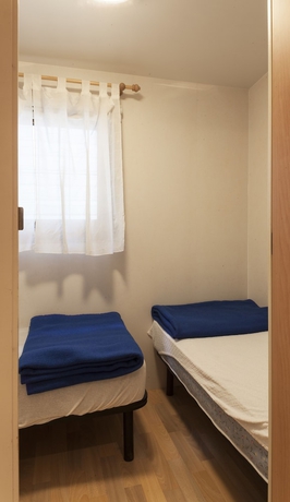 Imagen de la habitación del Hotel Concept Village Piccola Gardiola. Foto 17