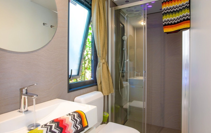 Imagen de la habitación del Hotel Concept Village Piccola Gardiola. Foto 19