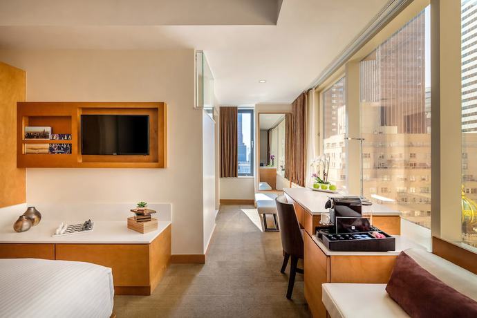 Imagen de la habitación del Hotel Concorde New York. Foto 18