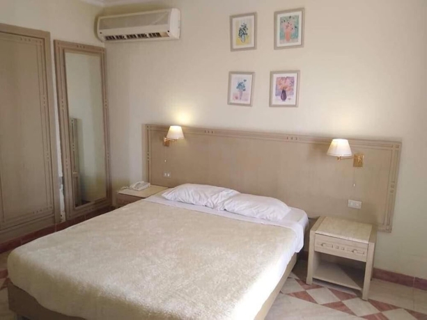 Imagen de la habitación del Hotel Concorde Royal Beach Resort. Foto 11