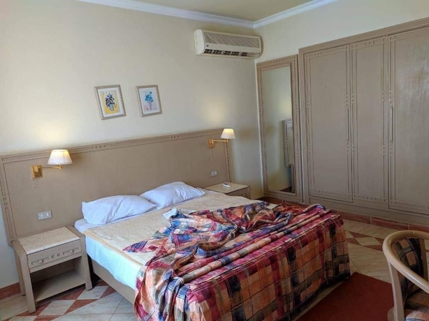 Imagen de la habitación del Hotel Concorde Royal Beach Resort. Foto 13