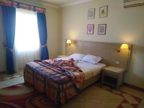 Imagen de la habitación del Hotel Concorde Royal Beach Resort. Foto 17