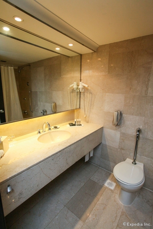 Imagen de la habitación del Hotel Concorde Singapore. Foto 9