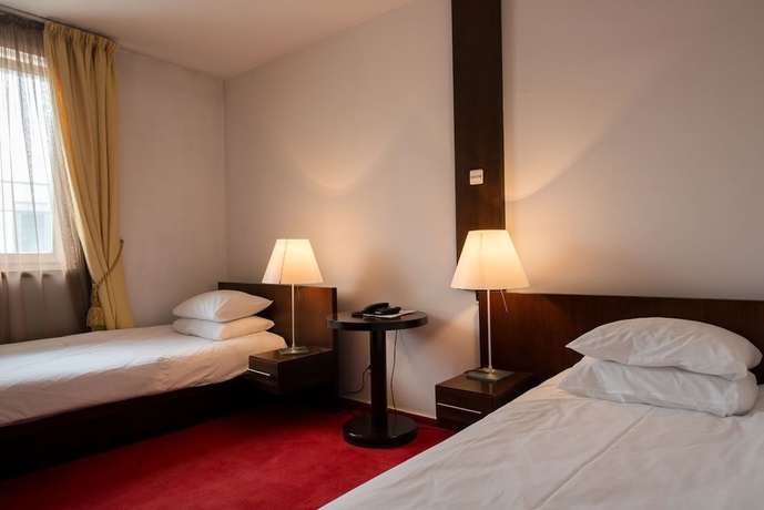 Imagen de la habitación del Hotel Concordia, Targu-Mures. Foto 14