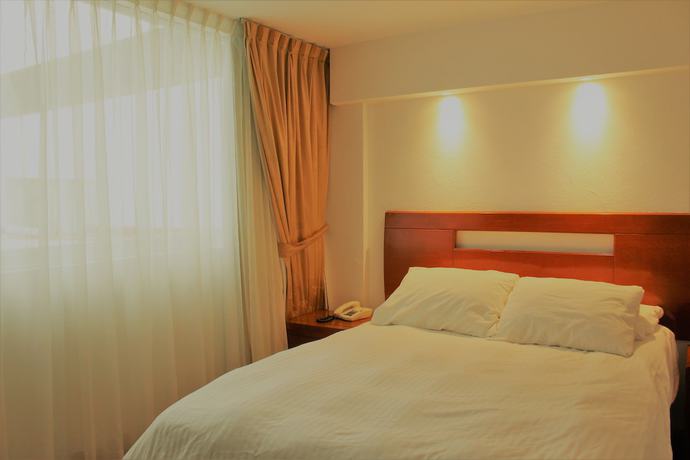 Imagen de la habitación del Hotel Condesa Suites. Foto 3