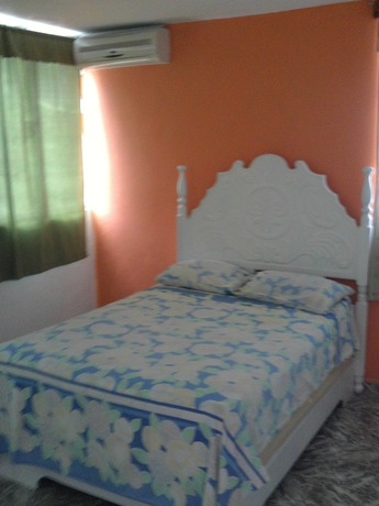 Imagen de la habitación del Hotel Condo Carla. Foto 9