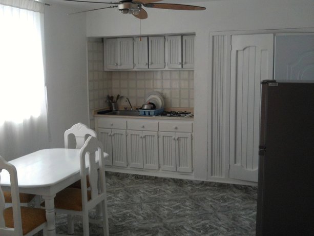 Imagen de la habitación del Hotel Condo Carla. Foto 11