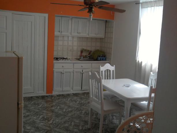 Imagen de la habitación del Hotel Condo Carla. Foto 15