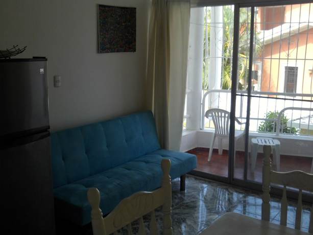 Imagen de la habitación del Hotel Condo Carla. Foto 16