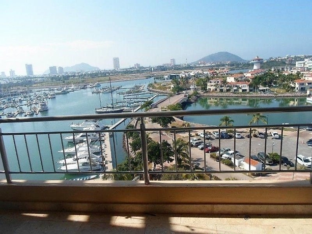 Imagen de la habitación del Hotel Condo Carla Marina. Foto 6