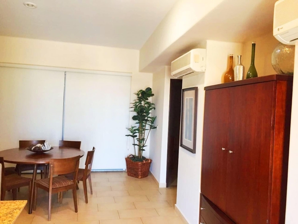 Imagen de la habitación del Hotel Condo Carla Marina. Foto 8