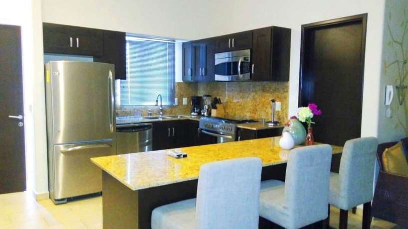 Imagen de la habitación del Hotel Condo Carla Marina. Foto 10