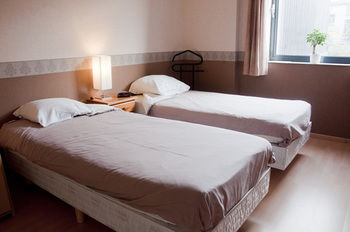 Imagen de la habitación del Hotel Condo Gardens Brussels. Foto 10