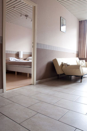 Imagen de la habitación del Hotel Condo Gardens Brussels. Foto 11