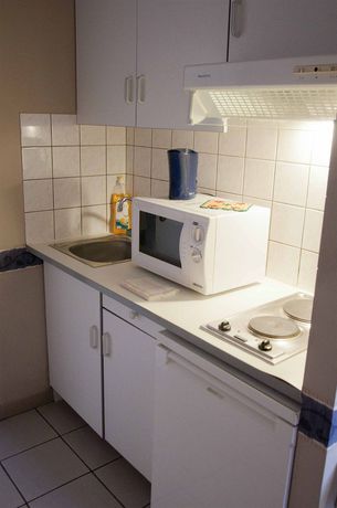 Imagen de la habitación del Hotel Condo Gardens Leuven. Foto 2