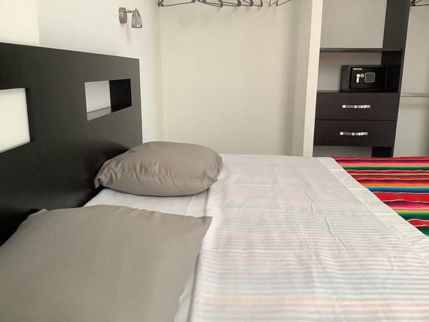 Imagen de la habitación del Hotel Condo Kiaraluna. Foto 6