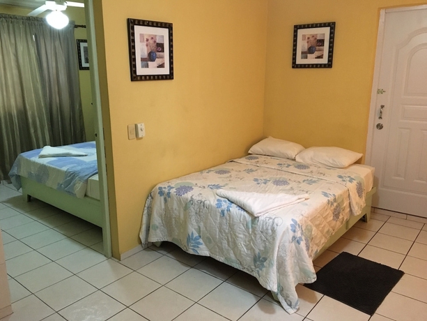 Imagen de la habitación del Hotel Condo Mango. Foto 2