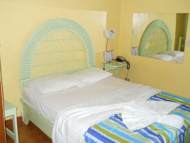Imagen de la habitación del Hotel Condo Mango. Foto 6