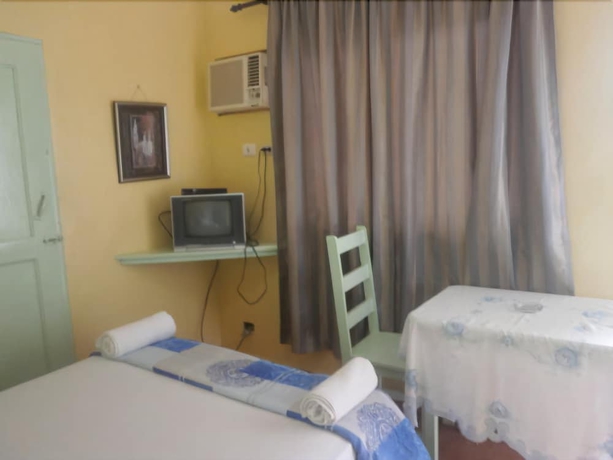 Imagen de la habitación del Hotel Condo Mango. Foto 8