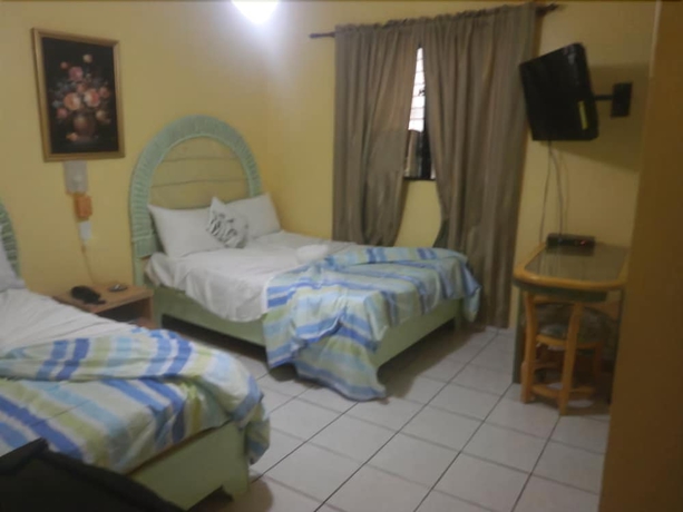 Imagen de la habitación del Hotel Condo Mango. Foto 9