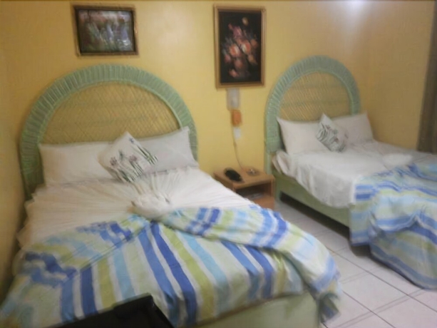 Imagen de la habitación del Hotel Condo Mango. Foto 10