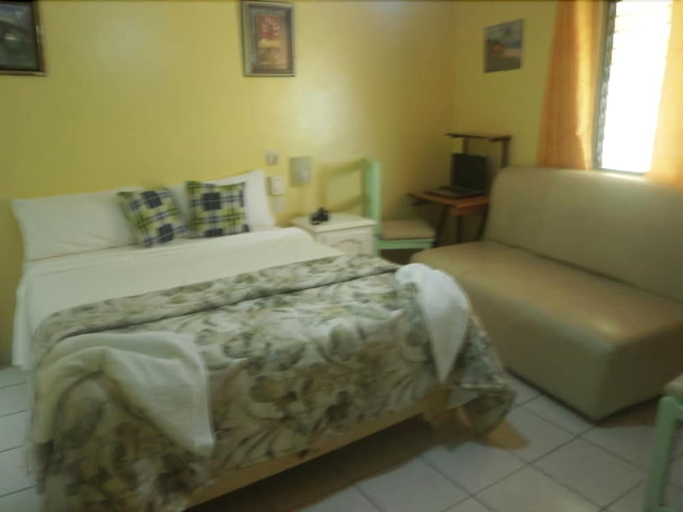 Imagen de la habitación del Hotel Condo Mango. Foto 11