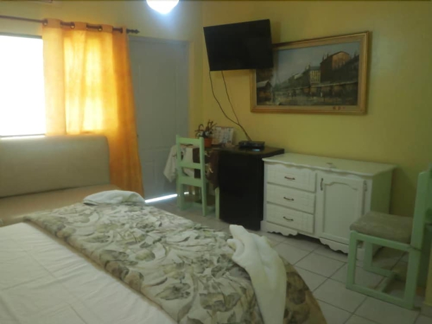 Imagen de la habitación del Hotel Condo Mango. Foto 12
