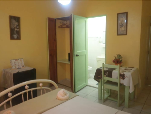 Imagen de la habitación del Hotel Condo Mango. Foto 13