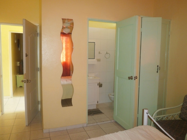 Imagen de la habitación del Hotel Condo Mango. Foto 14