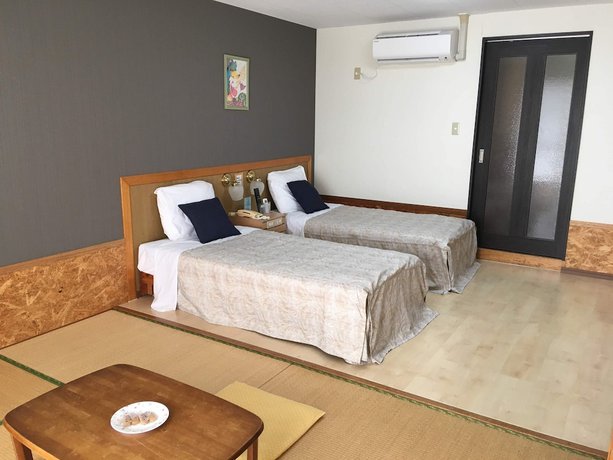 Imagen de la habitación del Hotel Condo Shimanchu Club. Foto 4