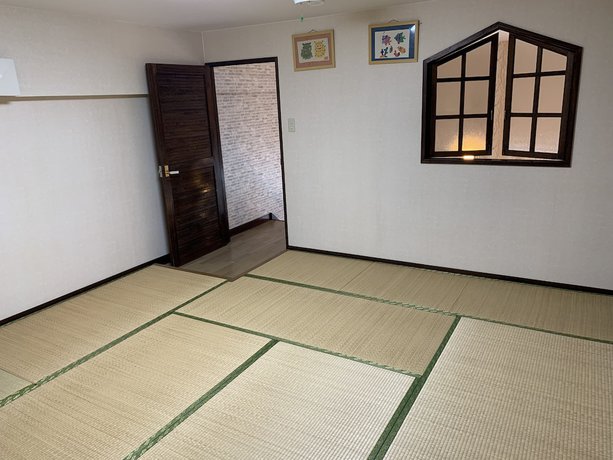 Imagen de la habitación del Hotel Condo Shimanchu Club. Foto 5