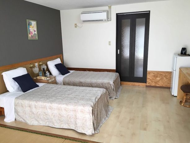 Imagen de la habitación del Hotel Condo Shimanchu Club. Foto 10