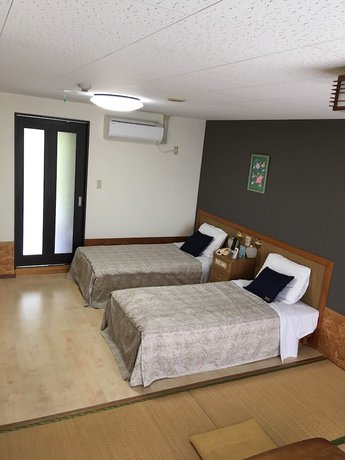 Imagen de la habitación del Hotel Condo Shimanchu Club. Foto 13