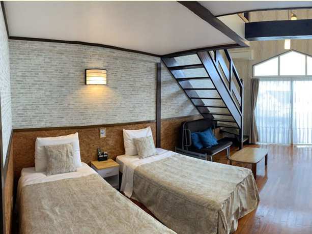 Imagen de la habitación del Hotel Condo Shimanchu Club. Foto 15