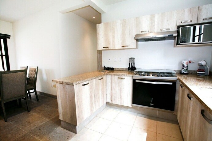 Imagen de la habitación del Hotel Condo hotel. Foto 19