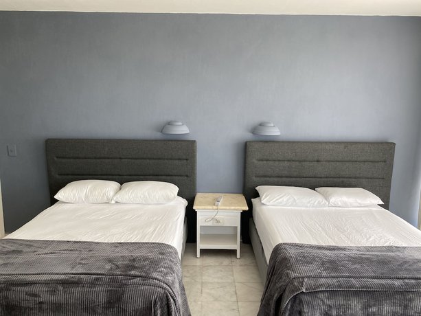 Imagen de la habitación del Hotel Condo in Ocean Front resort. Foto 8