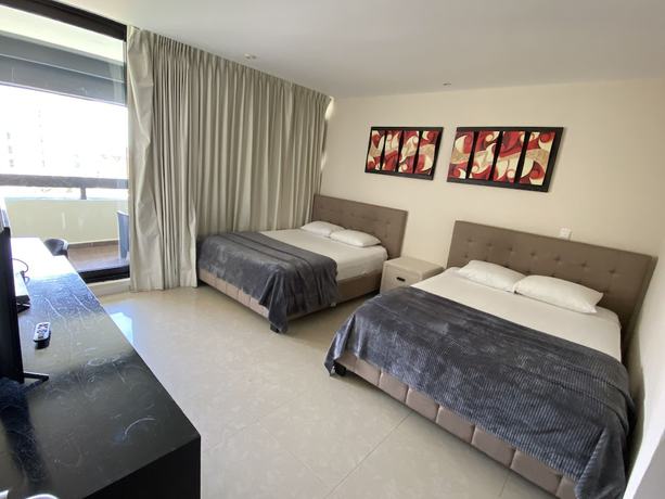 Imagen de la habitación del Hotel Condo in Ocean Front resort. Foto 9
