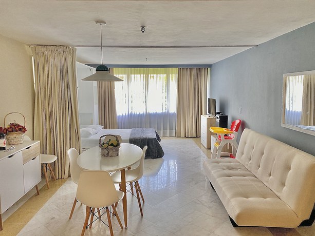 Imagen de la habitación del Hotel Condo in Ocean Front resort. Foto 12