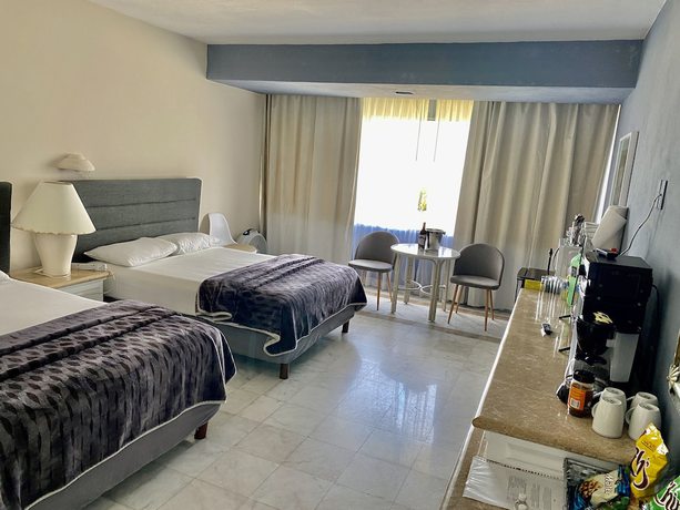 Imagen de la habitación del Hotel Condo in Ocean Front resort. Foto 15
