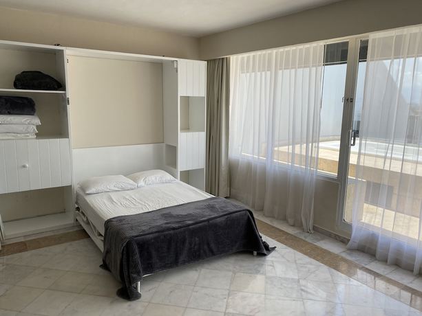 Imagen de la habitación del Hotel Condo in Ocean Front resort. Foto 16